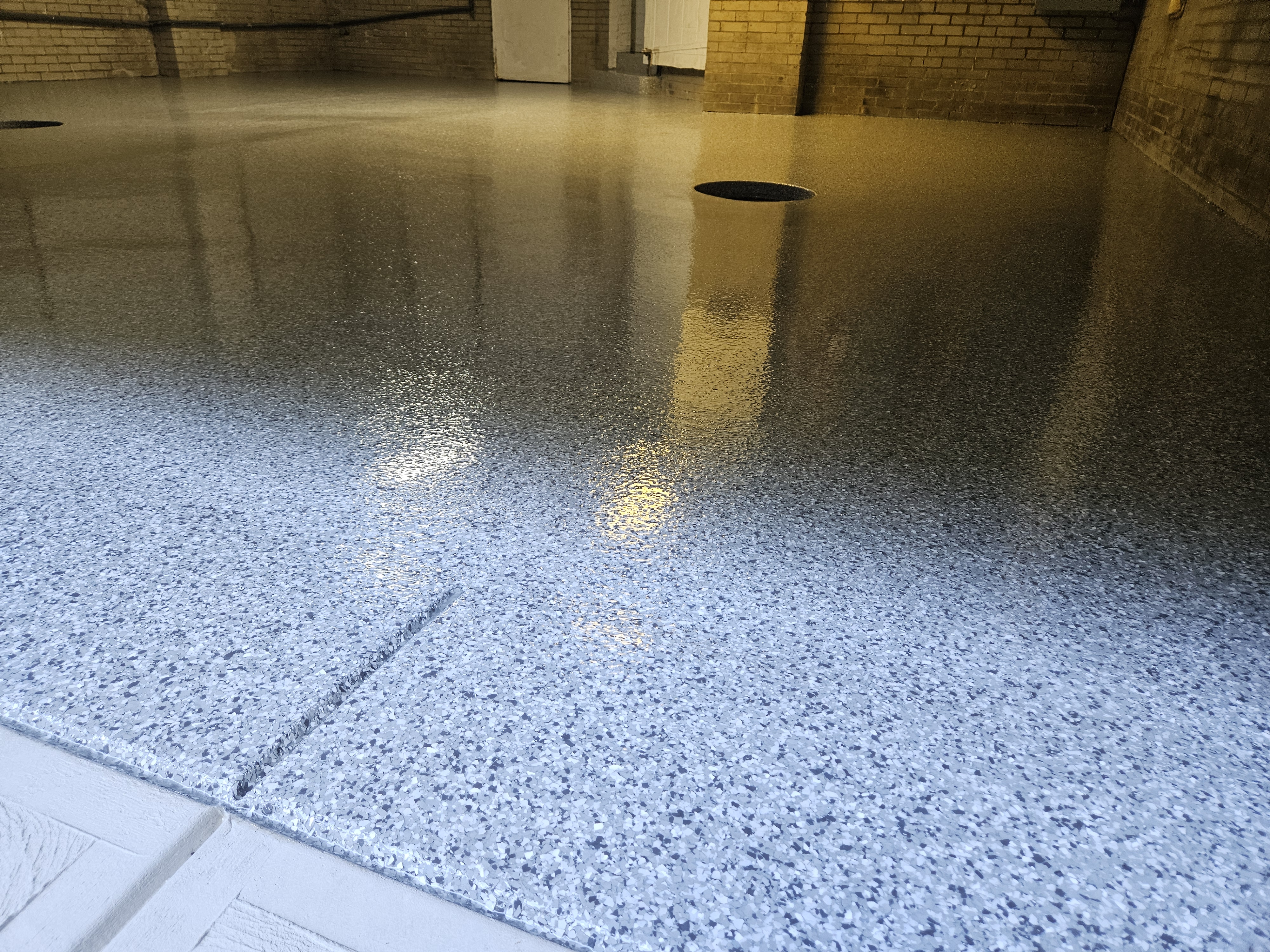 Flake Flooring installed by Northshore Specialty Surfaces