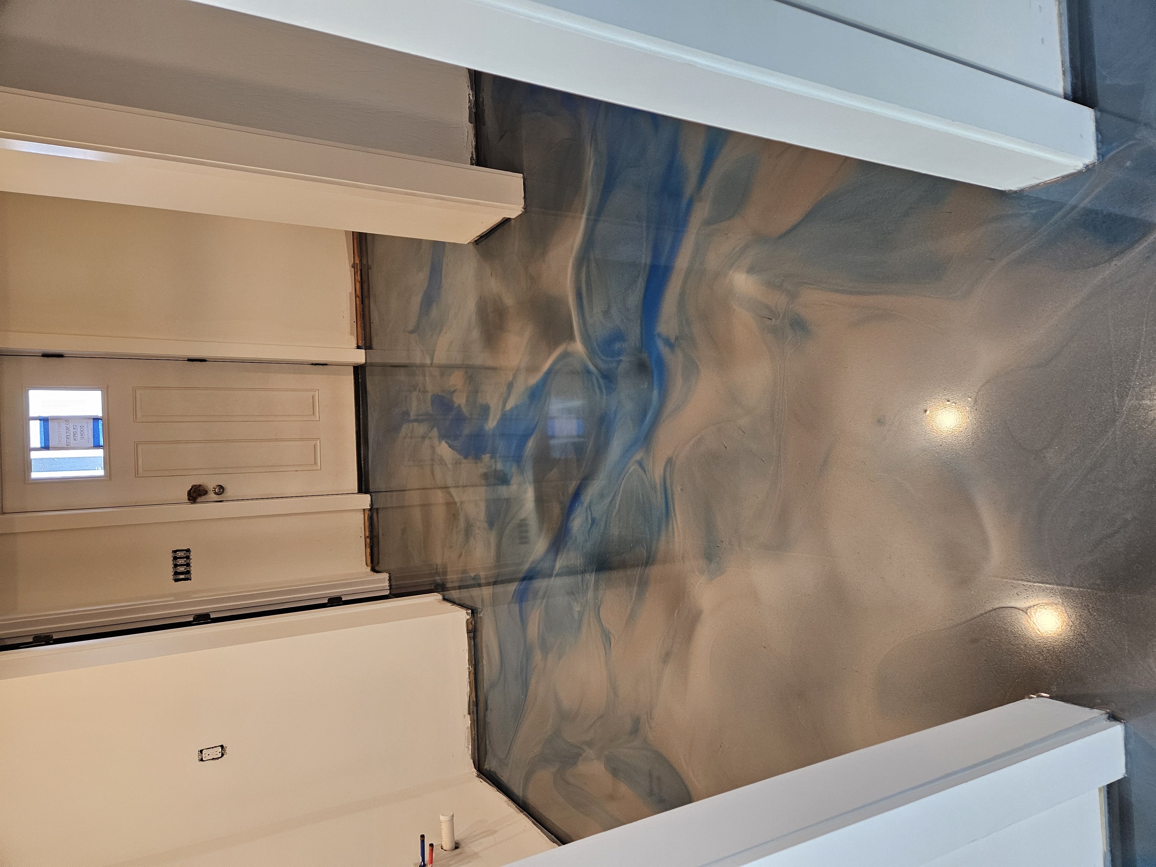 Metallic Epoxy installed by Northshore Specialty Surfaces